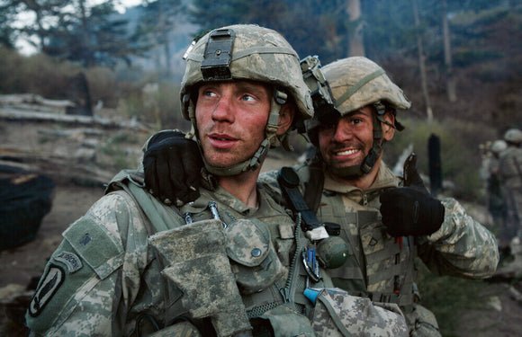 2nd Platoon, Battle Company, 2nd Battalion, 503rd Airborne Infantry Regiment, 173rd Airborne Brigade of the US Army during a 15 month deployment in the Korengal Valley, Kunar Province, North Eastern Afghanistan, 2007-2008. Photographed by Tim Hetherington
