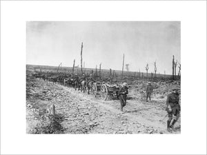 Ammunition limbers of 35th Field Battery, Royal Field Artillery, passing a corner of the shattered Delville Wood, Somme, 17th September 1916.