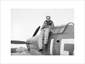 Squadron Leader Douglas Bader, CO of No. 242 Squadron, seated on his Hawker Hurricane at Duxford, September 1940.