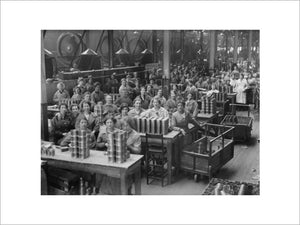 Women war workers range shell cases in the New Case Shop at the Royal Arsenal, Woolwich.