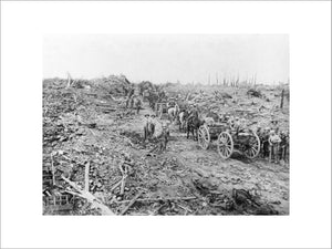 Horse-drawn ammunition limbers pass through the ruined village of Longueval, Somme, September 1916