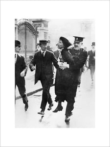 Mrs Emmeline Pankhurst, Leader of the Women's Suffragette movement, is arrested outside Buckingham Palace while trying to present a petition to King George V in May 1914.