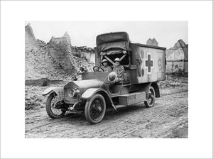 The two 'Women of Pervyse', Mairi Chisholm and the Baroness de T'Serclaes driving their motor ambulance through the ruins of Pervyse.
