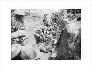 Wounded men being tended in a trench near Beaumont Hamel on the morning of the initial assault, Battle of the Somme, 1st July 1916.