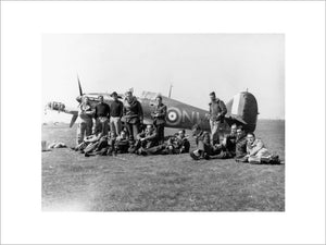 Pilots of No. 33 Squadron RAF, at Larissa, Greece, with Hawker Hurricane Mark I, V7419, in background.