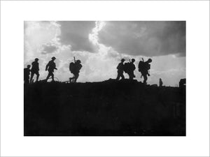 Men of the East Yorkshire Regiment crossing newly won ground at Frezenburg in 1917 during the Third Battle of Ypres.