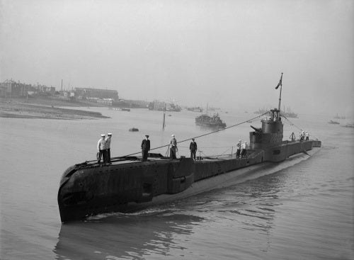 HM Submarine TAKU returns home after a year's successful service in the Mediterranean,  3 August 1943.