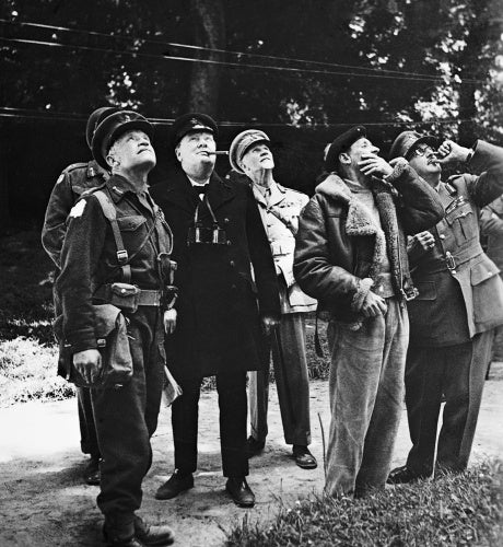 Winston Churchill and senior Allied commanders looking up at aircraft activity overhead during a visit to General Montgomery's headquarters in Normandy, 12 June 1944.