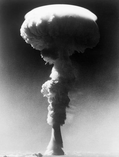 The mushroom cloud generated during Britain's first hydrogen bomb test over Malden Island in the Central Pacific, dropped by a Royal Air Force Valiant bomber, 15 May 1957.