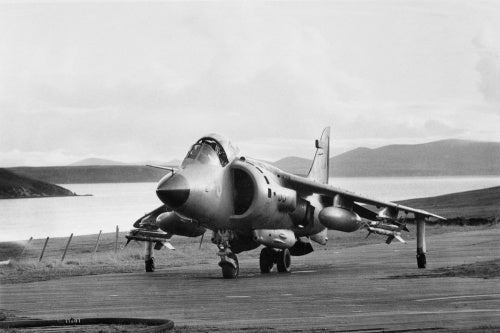 A Sea Harrier on the temporary airstrip constructed at San Carlos on the Falkland Islands, named HMS SHEATHBILL, June 1982.
