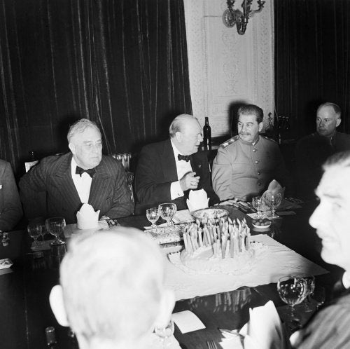 Winston Churchill with President Roosevelt and Marshal Stalin at a dinner party at the British Legation in Tehran on the occasion of Churchill's 69th birthday, 30 November 1943.