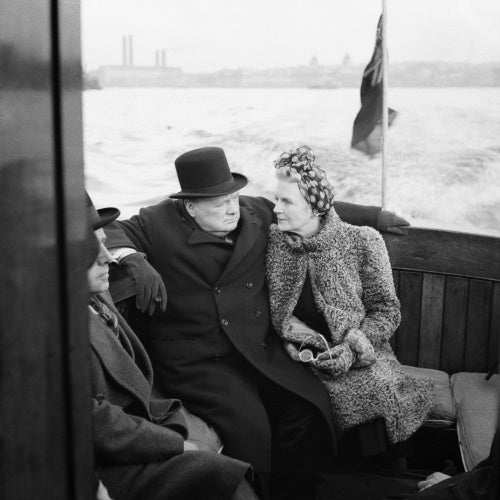 Winston Churchill and his wife, Clementine, on board a naval auxiliary patrol vessel during a visit to the London docks, 25 September 1940.