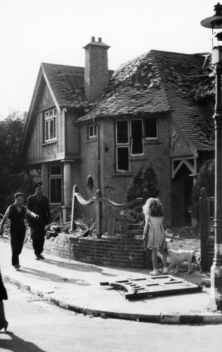 A bomb-damaged house in Gosport after a German air raid on 12 August 1940.