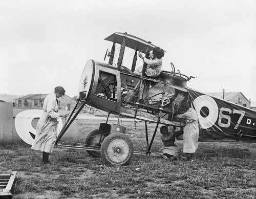 Air Mechanics of the Women's Royal Air Force (WRAF) working on the fuselage of an Avro 504 aircraft during early 1919.