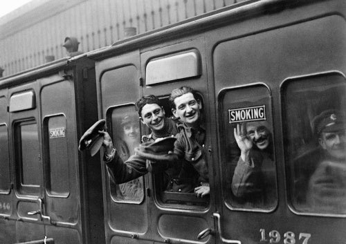 Soldiers onboard a leave train heading out from Victoria Station, London during the First World War.