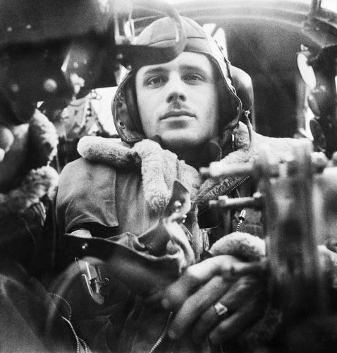 The Royal Air Force: The rear gunner in his position in a Wellington bomber.