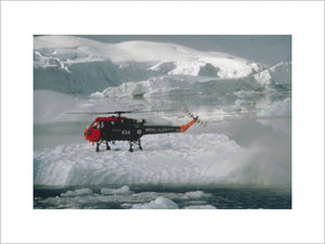 A Wasp helicopter from the Ice Patrol Ship HMS ENDURANCE touches down on pack ice during a survey operation in the Antarctic, 1980.