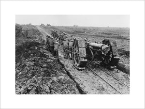 A 6-inch howitzer being manhauled through the mud near Pozieres during the Battle of the Somme in September 1916.