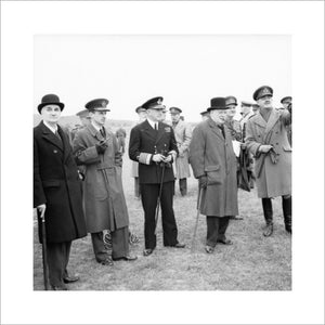 Winston Churchill with his scientific advisor Lord Cherwell (extreme left), Air Chief Marshal Sir Charles Portal and Admiral of the Fleet Sir Dudley Pound, watching a display of anti-aircraft gunnery, June 1941.
