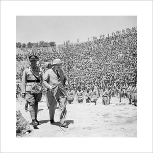 Winston Churchill leaves the old Roman amphitheatre at Carthage in Tunisia with First Army Commander, Lieutenant General Anderson, after addressing British troops on 1 June 1943.