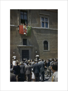 Allied troops on the flag draped balcony of Palazza Venezia