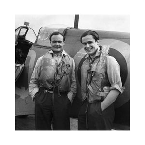 Two Battle of Britain fighter pilots, Flight Lieutenant  Brian Kingcome (left), commanding officer of No 92 Squadron RAF and his wingman, Flying Officer Geoffrey Wellum, next to a Spitfire at RAF Biggin Hill, Kent, 1941