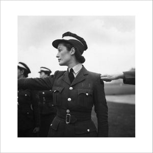 A WAAF cadet in training lines up on parade, RAF Bridgenorth, Shropshire, 1941