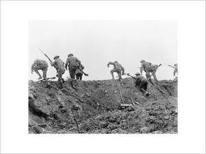 Still from the British film "The Battle of the Somme". The image is part of a sequence introduced by a caption reading "British Tommies rescuing a comrade under shell fire".