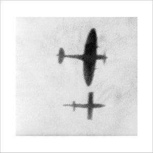 A Supermarine Spitfire flying alongside a V-1 flying bomb in an attempt to disrupt the airflow over its wing and force it to crash, August 1944.
