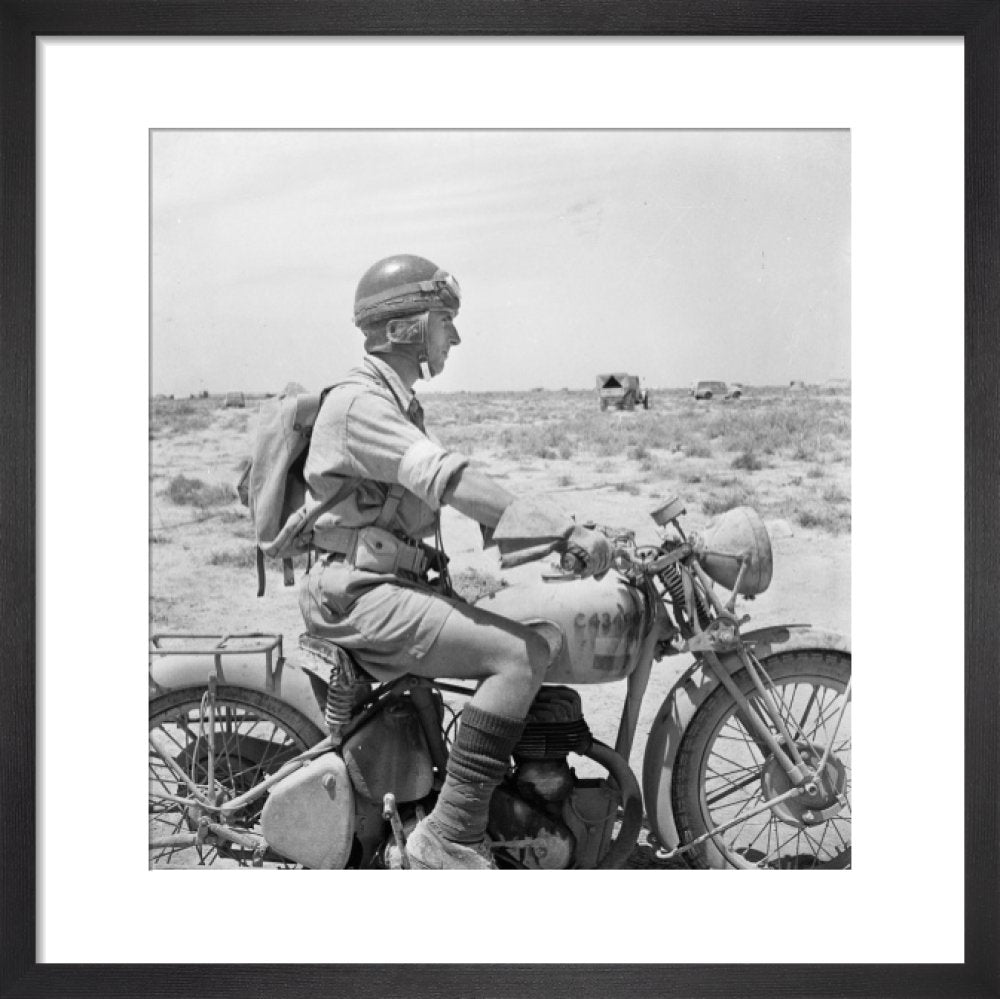Western Desert: An Army despatch rider on his machine in the desert ...