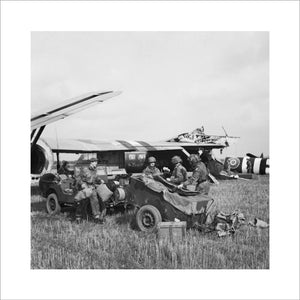HQ of 1st Airlanding Light Regiment, Royal Artillery, unload a jeep and trailer from their Horsa glider at the landing zone near Wolfheze in Holland, during Operation 'Market Garden', 17 September 1944.