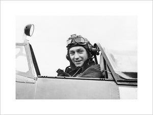 Wing Commander Raymond Harries, commanding the Tangmere Wing, in the cockpit of his Spitfire Mk XII, 1943.