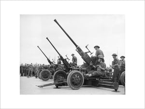Royal Artillery 40mm Bofors guns being assembled on their arrival in Greece, 25 November 1940.