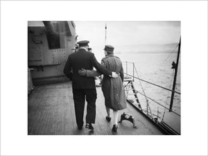 Winston Churchill and his daughter Mary walking arm in arm aboard HMS DUKE OF YORK in the Clyde, shortly before the Prime Minister left for the United States, December 1941