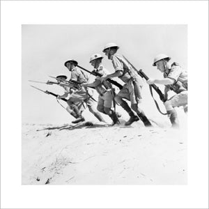 Men of the 51st Highland Division charging with fixed bayonets during a training exercise in the desert, North Africa, 23 September 1942.