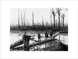 Australian troops walk along a duckboard track through the remains of Chateau Wood, Third Battle of Ypres (Passchendaele)