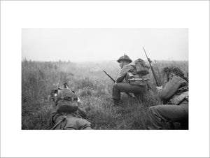Men of 12 Platoon, 'B' Company, 6th Royal Scots Fusiliers prepare to advance at the start of Operation 'Epsom', Normandy, 26 June 1944.