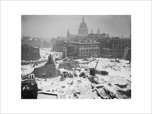 A winter scene of Bomb damaged buildings around St Paul's Cathedral, January 1942.