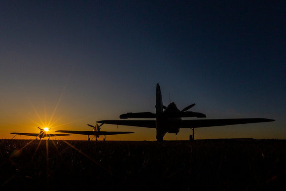 Hawker Hurricane moving to the runway at the Duxford Airfield during sunrise
