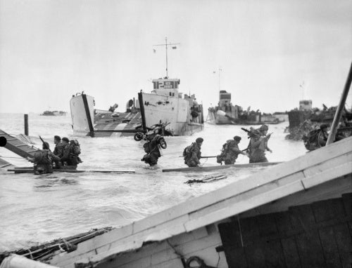 Commandos of 48 (RM) Commando coming ashore from landing craft at St Aubin-sur-Mer on Juno Beach, 6 June 1944.