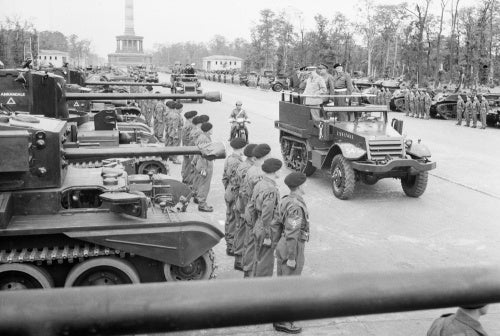 Winston Churchill, accompanied by Field Marshal Sir Bernard Montgomery and Field Marshal Sir Alan Brooke, inspects tanks of 7th Armoured Division in Berlin, 21 July 1945.