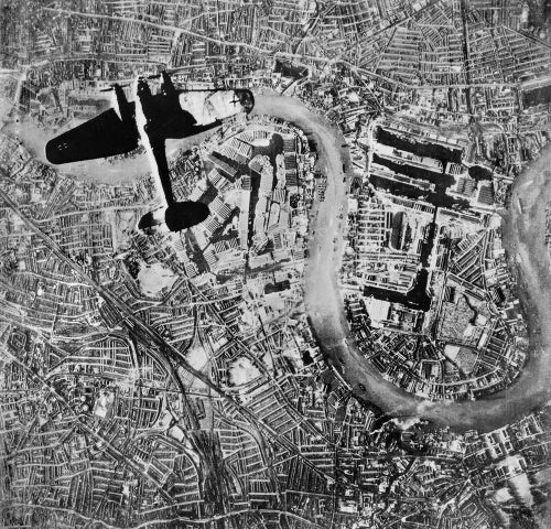 A Heinkel He 111 bomber flying over the East End of London at the start of the Luftwaffe's evening raids of 7 September 1940.