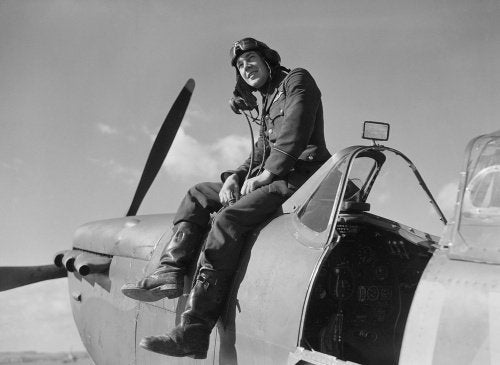 Flying Officer Leonard 'Ace' Haines of No. 19 Squadron on his Supermarine Spitfire Mk I at Fowlmere near Duxford, September 1940.