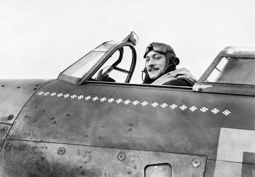 Squadron Leader Robert Stanford Tuck, commanding No. 257 Squadron, in the cockpit of his Hawker Hurricane at Martelsham Heath, November 1940.
