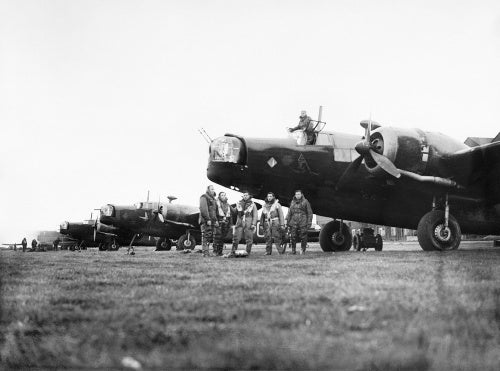 Aircrew and Wellington bombers of No. 149 Squadron RAF at Mildenhall, Suffolk, before a night raid over Germany, 10 May 1941.