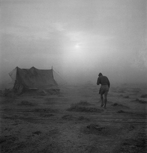 A soldier battling his way through a sandstorm in the Western Desert during 1942.