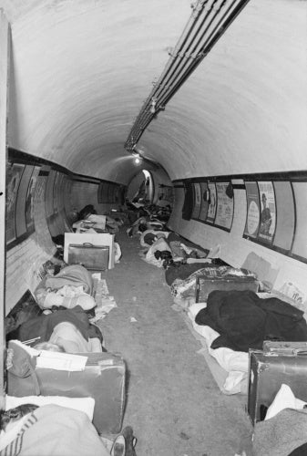 Londoners sleeping in the passageway of a London Underground station, probably Aldwych, in November 1940.