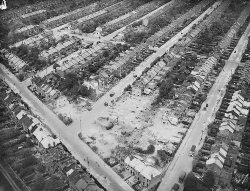 The damage caused by a German V-2 rocket which exploded at the junction of Wanstead Park Road and Endsleigh Gardens in Cranbrook, Ilford, on 8 March 1945.