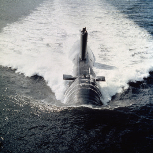 HMS CONQUEROR, the Churchill class nuclear-powered fleet submarine, underway in the early 1970s.  In 1982, the submarine sank the Argentine cruiser ARA BELGRANO during the Falklands War.
