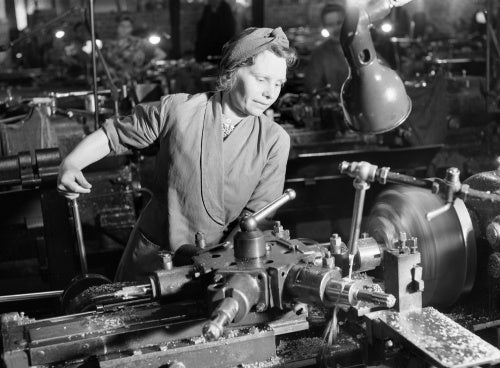 Mrs D Cheatle from Sheffield operating a capstan lathe at a munitions factory in Yorkshire during 1942.